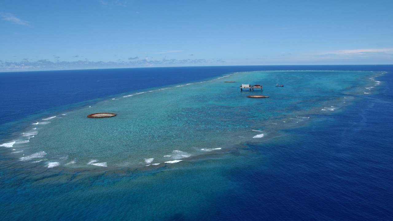 Japan says Chinese and Russian warships held live-fire drills within its EEZ