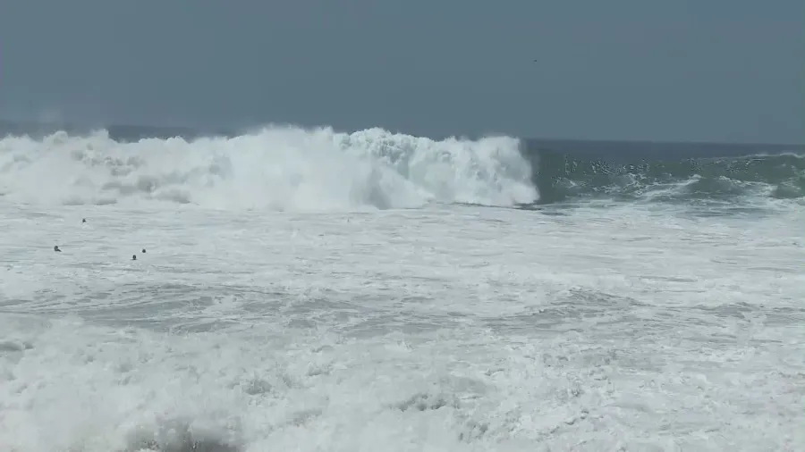 100 rescues in Newport Beach as high surf hits Southern California