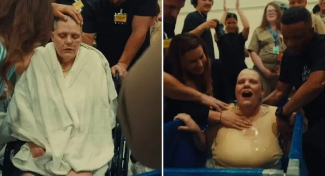Žena ostavila invalidska kolica i masku s kisikom kako bi se krstila u zatvoru