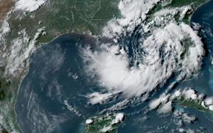 Tropical depression nearing US Gulf Coast set to become a tropical storm, forecasters say