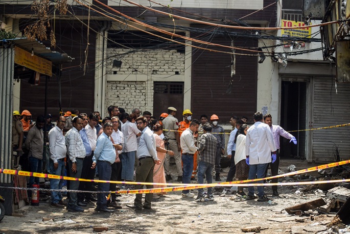 17 foreigners among 21 killed in Delhi hotel fire