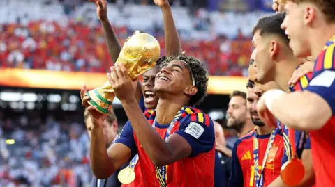 Lamine Yamal celebrates World Cup win with little brother who charmed fans